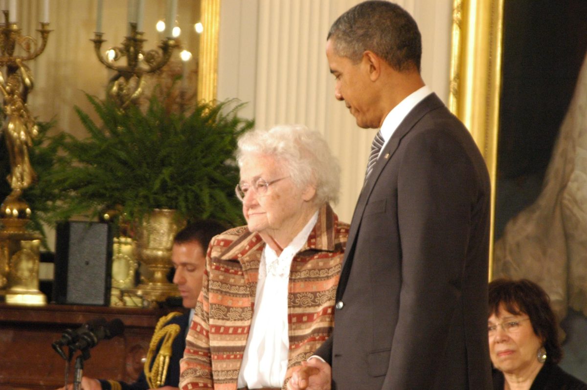 President Obama presenting "The National Citizen Award" to Mary (Milly) Bloomquist Jr. at the White House.
