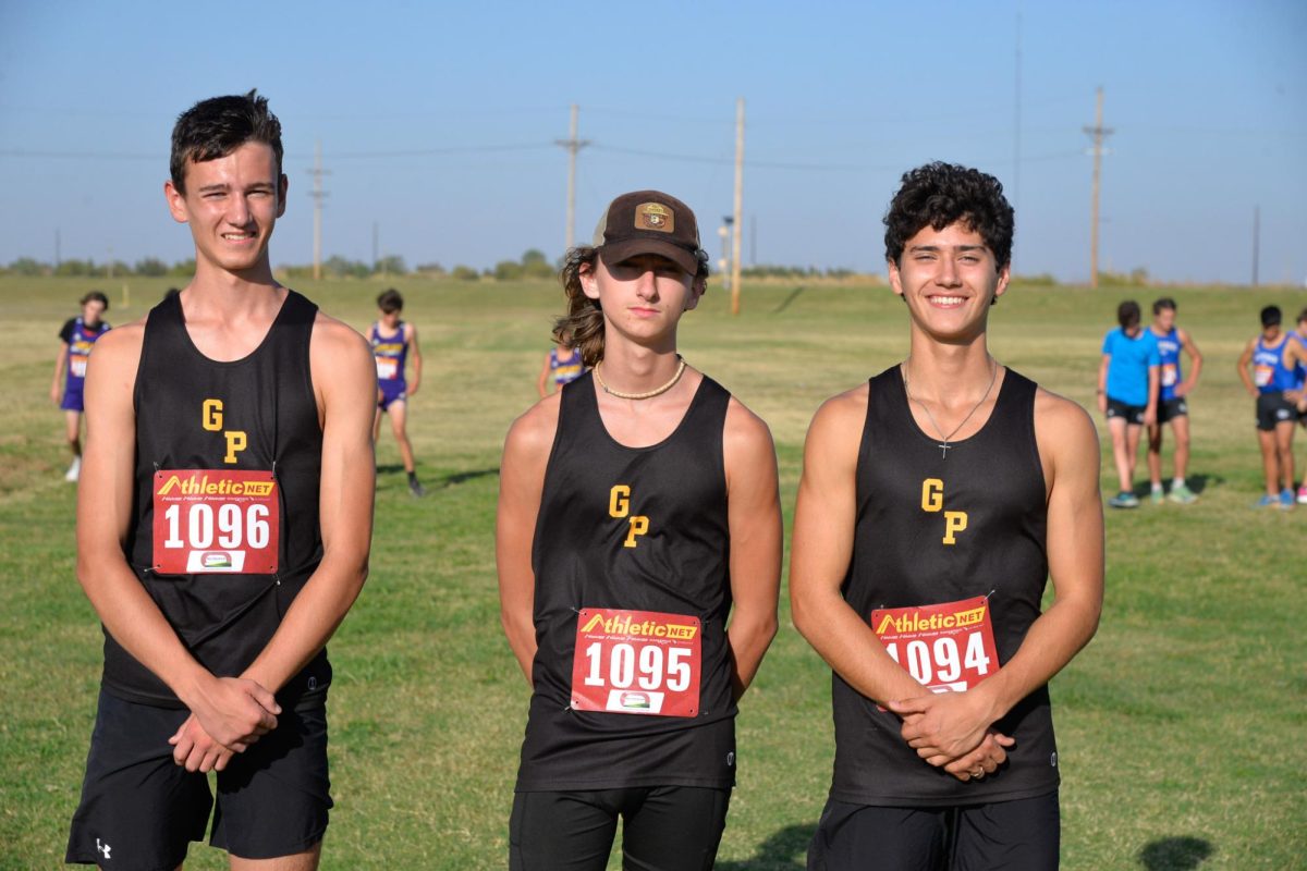 Logan Mckim, Kai Larid, and Arthur Boyle posing for a post race picture. 