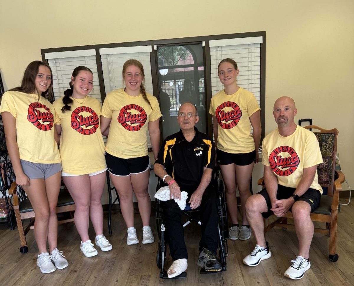 GP Student Council members visited custodian Doug Knoblauch to deliver a community donation for his health care expenses.